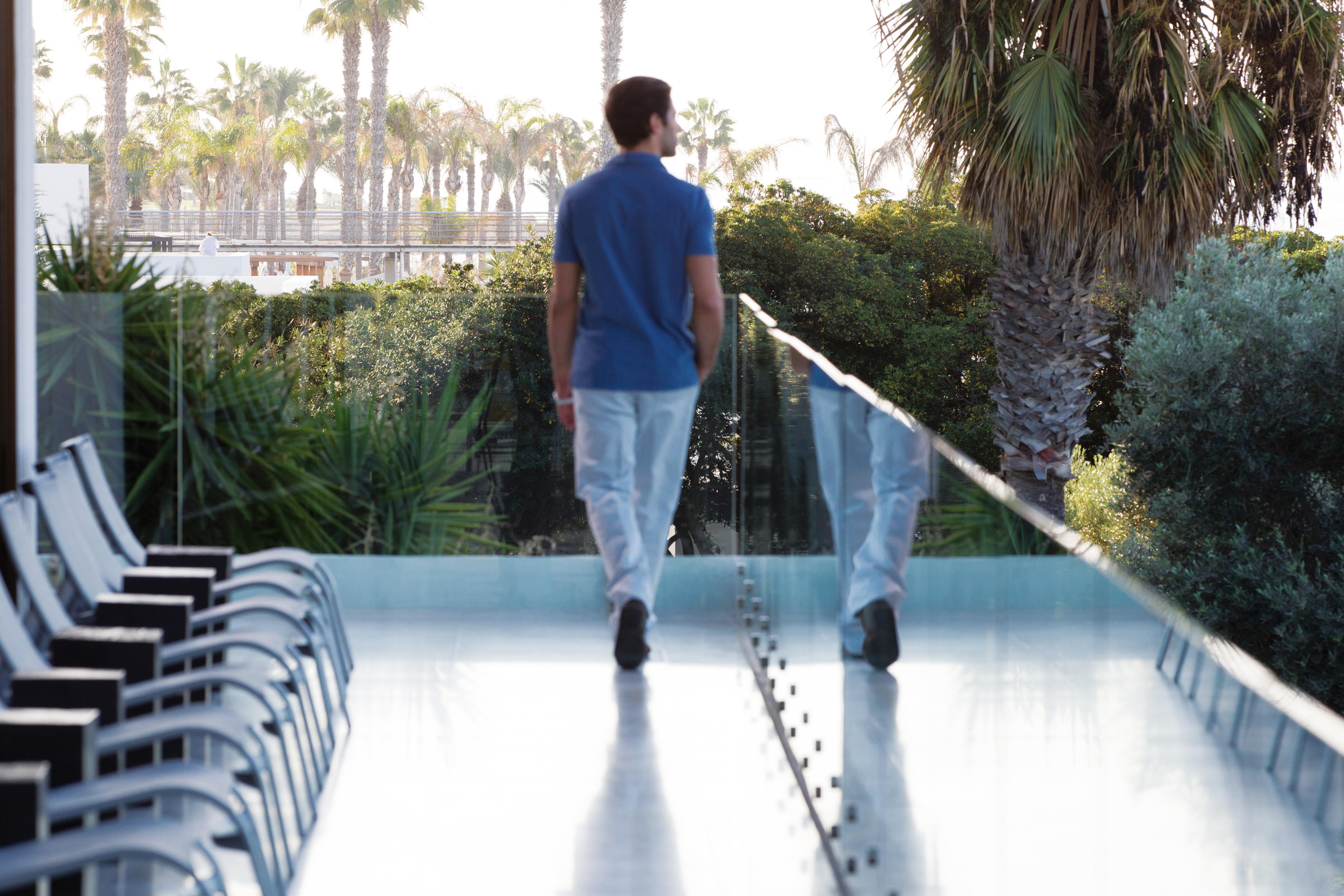 Almyra Hotel Paphos Ngoại thất bức ảnh A man walking