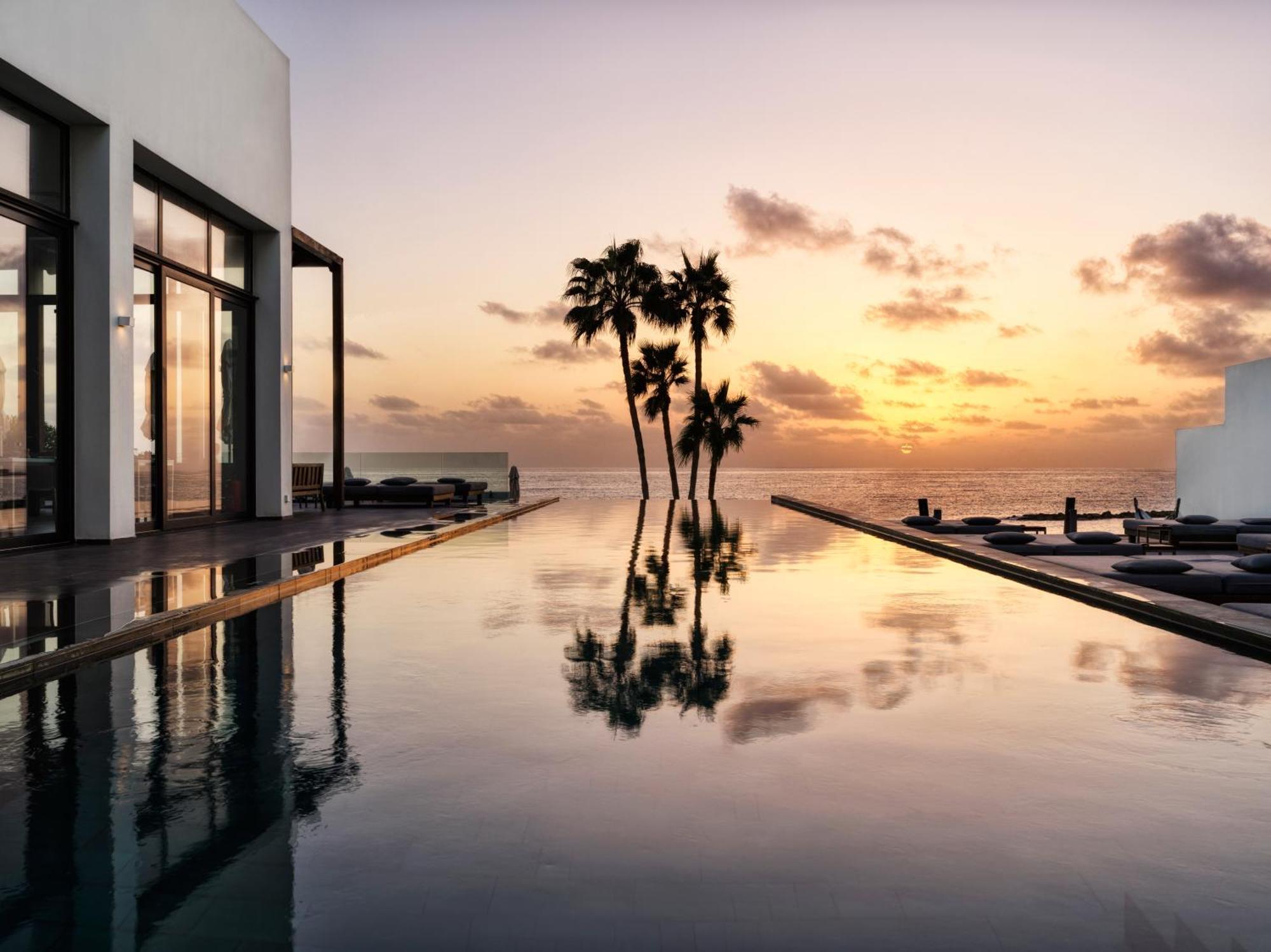 Almyra Hotel Paphos Ngoại thất bức ảnh Sunset at the St Regis Maldives